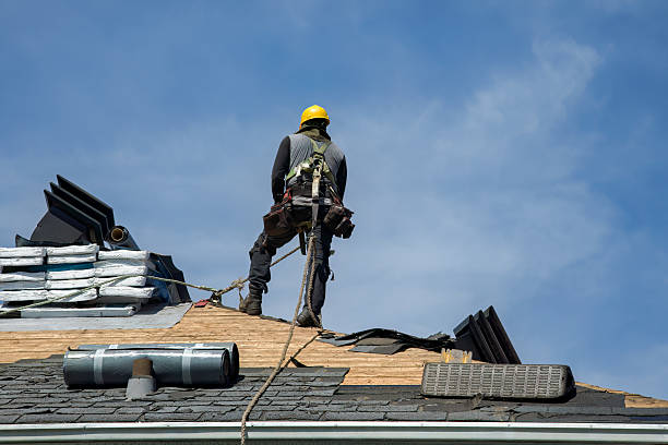 Professional Roof Replacement technician working in Greenville, IN
